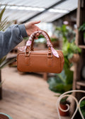 Bauletto in vera pelle, Eleganza senza tempo